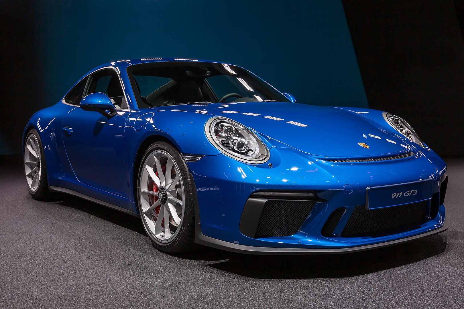 Das ist ein blauer Porsche GT3 Touring