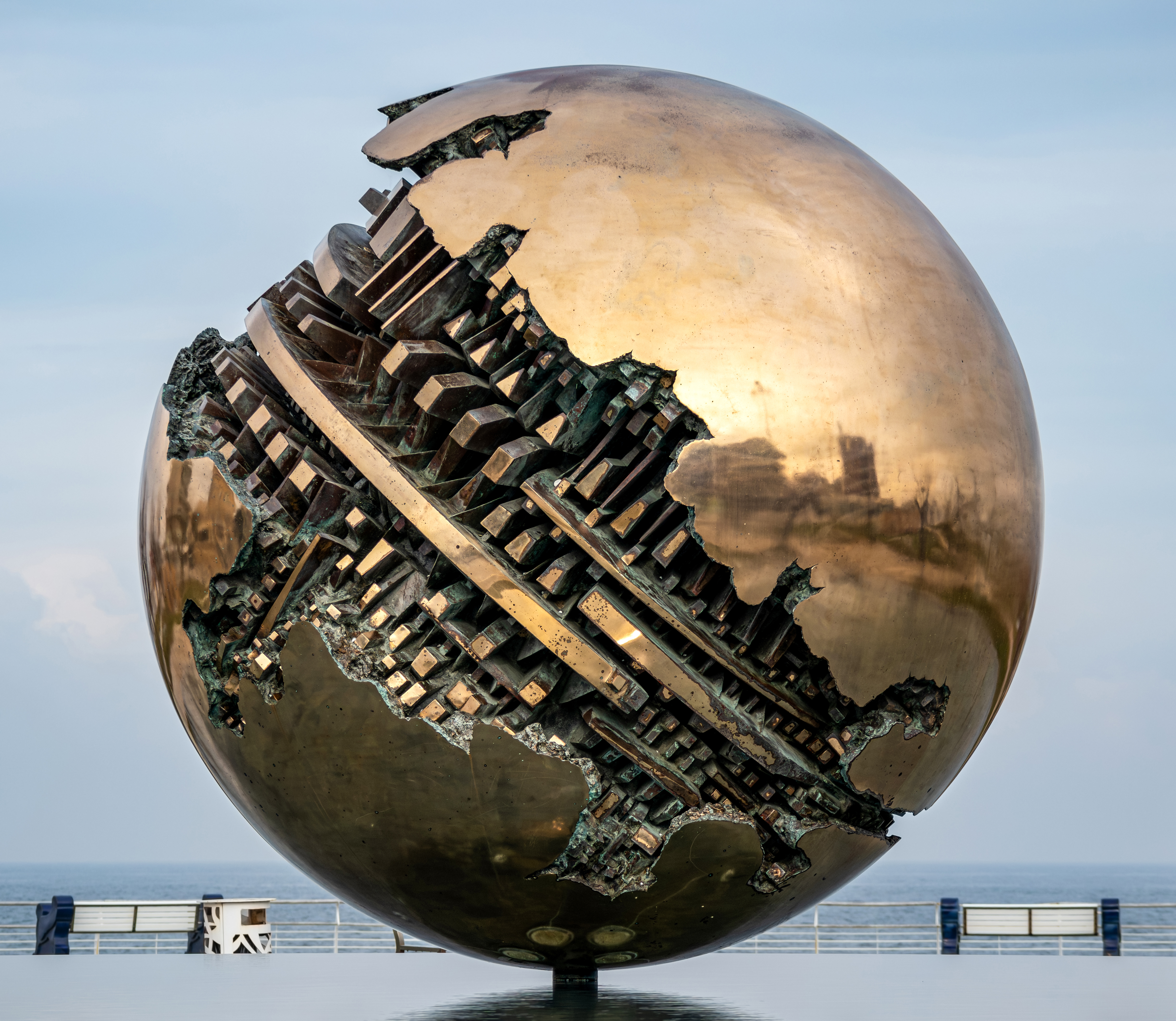 The bronze scuppture "Sfera grande" (Large sphere) by italian artist Arnaldo Pomodoro